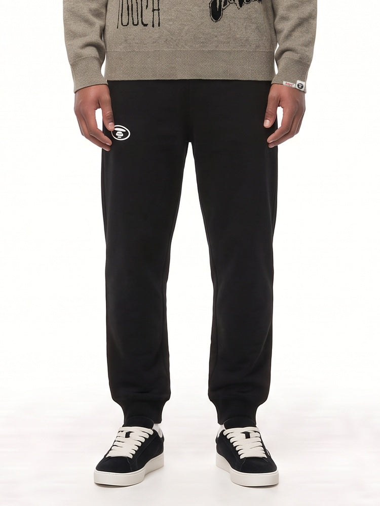 AAPEUNVS Moonface logo sweat pants